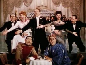 Colorized photo from Du Barry Was a Lady, featuring the entire cast - Gene Kelly, Lucille Ball, Red Skelton, Virginia Mayo, Rags Ragland, Zero Mostel