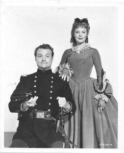 Red Skelton disguised as a Confederate soldier with Arlene Dahl in Southern Yankee