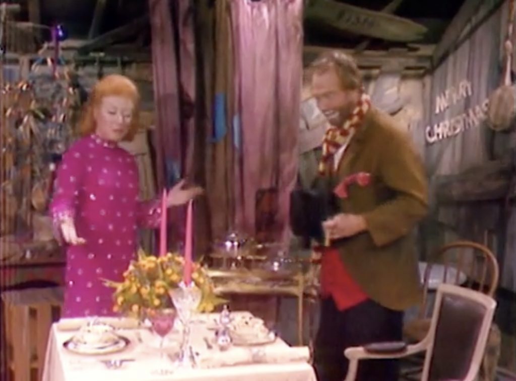 Greer Garson has prepared an after-show dinner for Freddie the Freeloader at his shack, in the conclusion of "The Christmas Spirit"