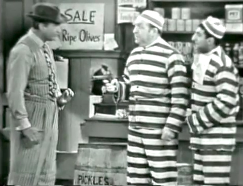 Dimwitted Clem thinks that the escaped convicts are police officers!