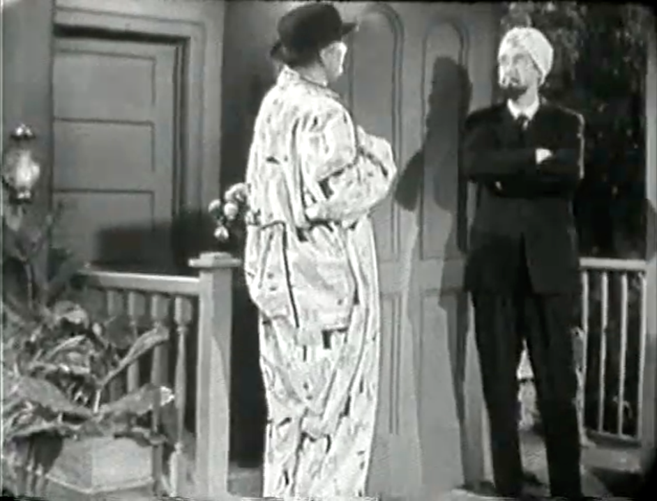 George Appleby meets the new boarder (John Carradine) at 3 o'clock in the morning!