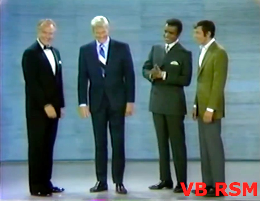 Red Skelton onstage with Peter Graves - who's joined by his Mission Impossible costars, Greg Morris and Leonard Nimoy