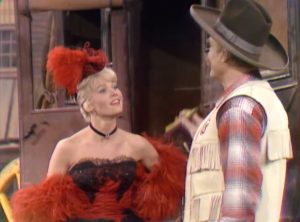 Pat Priest, fresh off the stagecoach, talking to Sheriff Deadeye (Red Skelton) in Our Man Fink