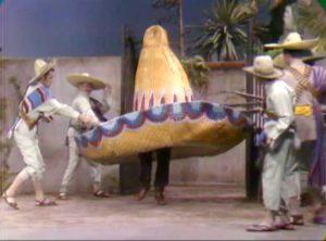 Sheriff Deadeye tries to escape Pancho Vanilla's hideout, disguised as a giant sombrero