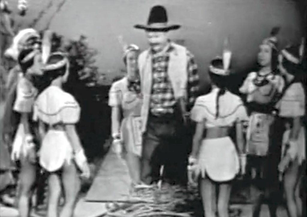 The Indian maidens about to dance around Deadeye … what can save him?