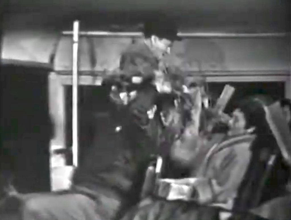Chester (Red Skelton) assaults the poor bus driver in "The Unwanted Christmas Tree"