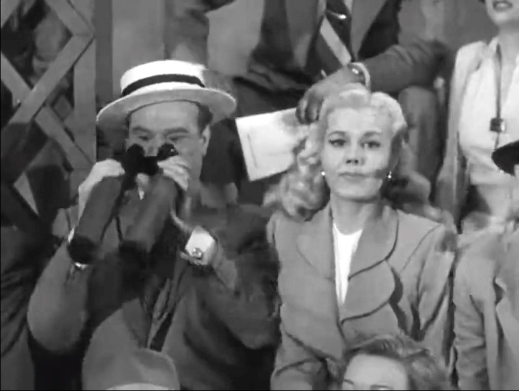 Red Skelton at the ball game, using binoculars  and annoying Lucille Knoch