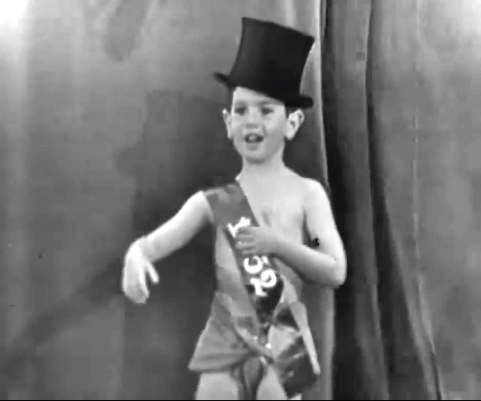 Richard Skelton as Baby New Year 1952 at the conclusion of Learn to Dance in Ten Easy Lessons or One Hard One