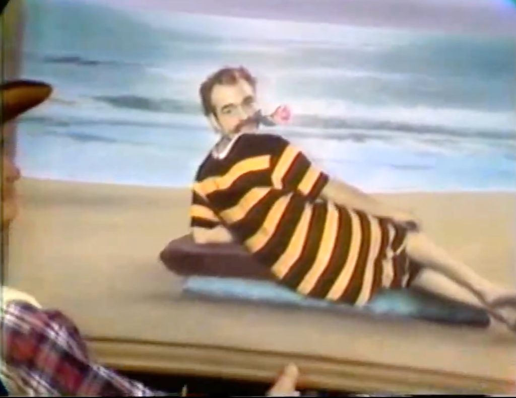 And on the backside of the incriminating painting, it's … Bathing Suit Deadeye!