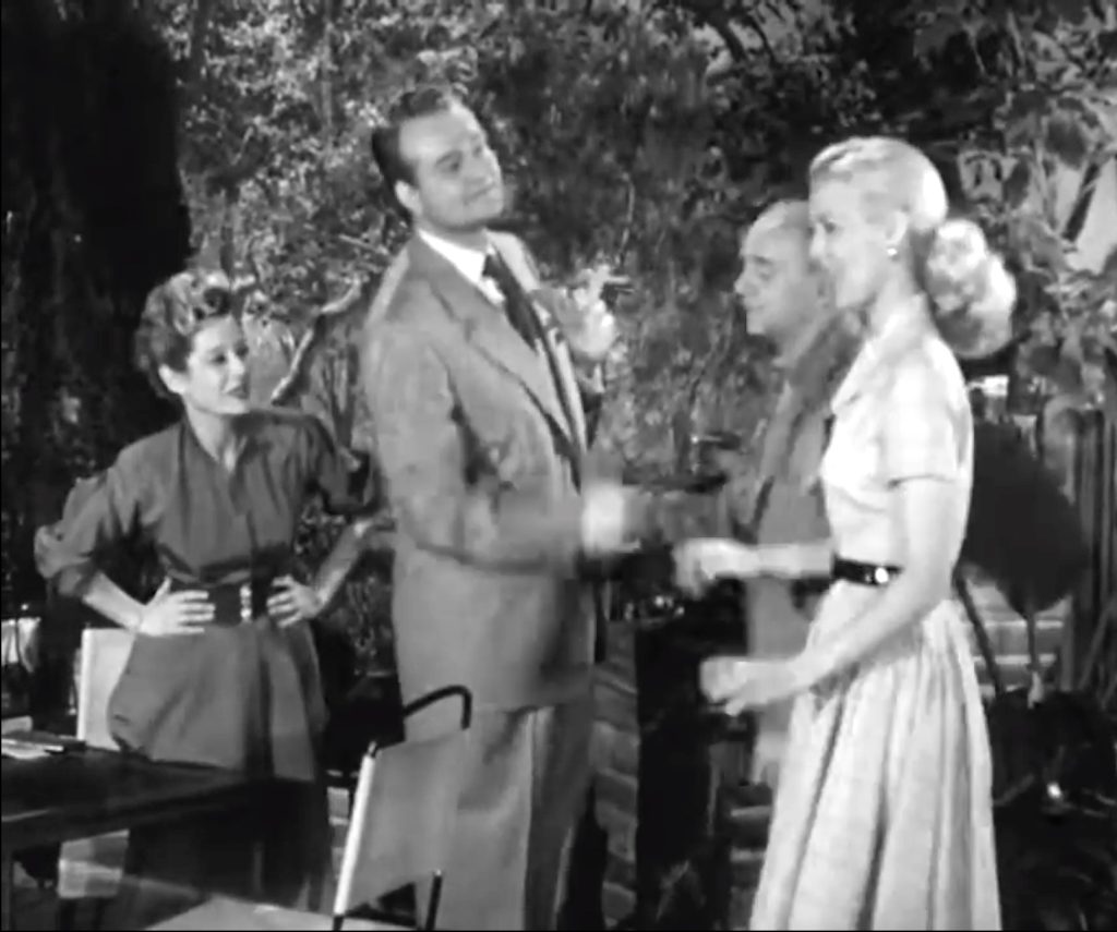 Bridge game - Robin Raymond as the upset wife, Red Skelton greeting the attractive Mrs. Jones (Lucille Knoch) too aggressively