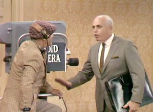Allen Funt prepares a Candid Camera trap for George Appleby in "Better Dead than Wed"