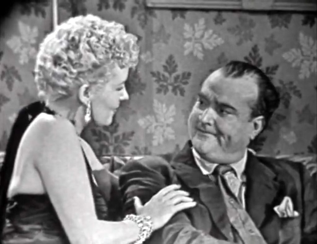 Perhaps Mr. Lasagna's moll, Choo-Choo (Vici Raaf) can get the secret out of Red