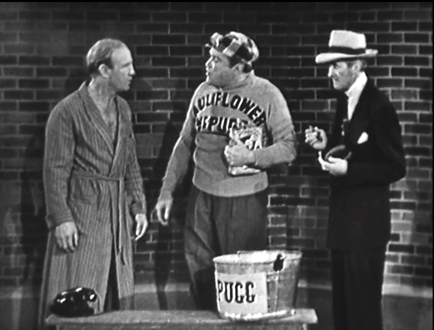 Dirty McGurk (Gil Perkins), Cauliflower McPugg and his manager Dick Ryan in the "Clean Fighter" Tide commercial