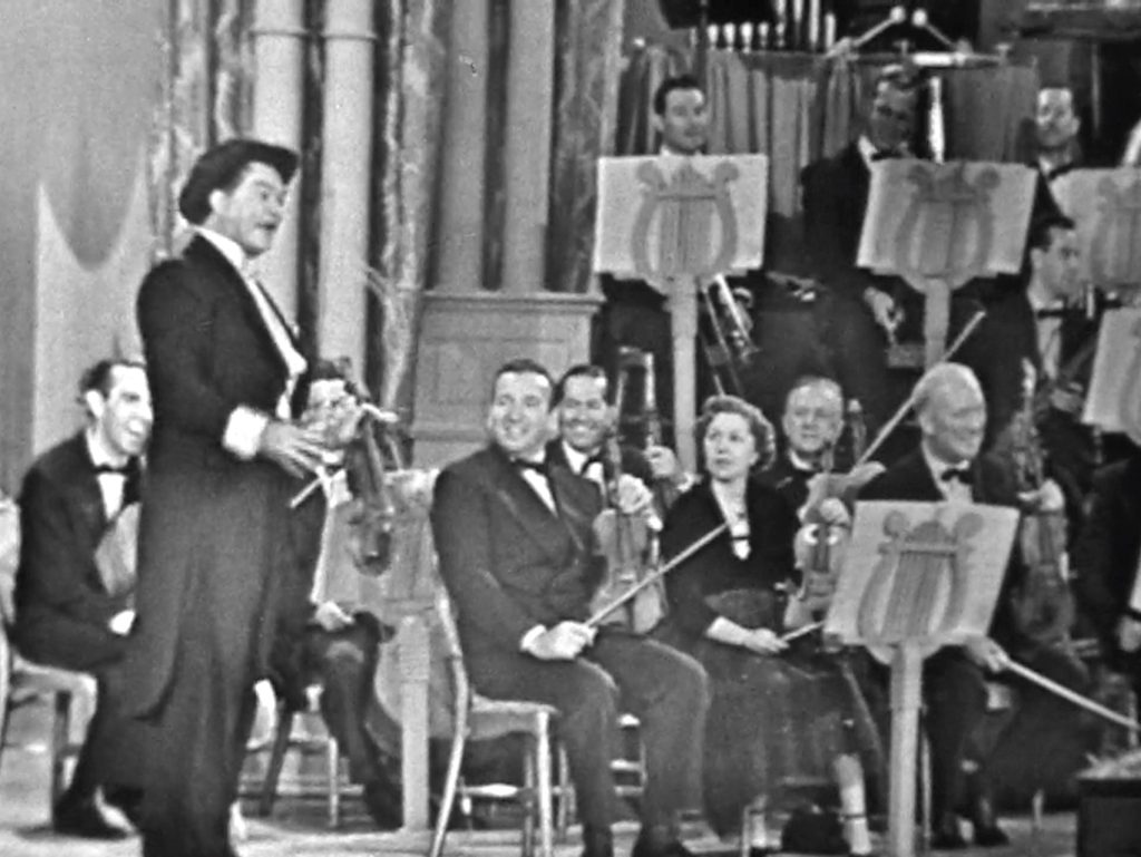 Clem Kadiddlehopper clowning around with David Rose's Orchestra
