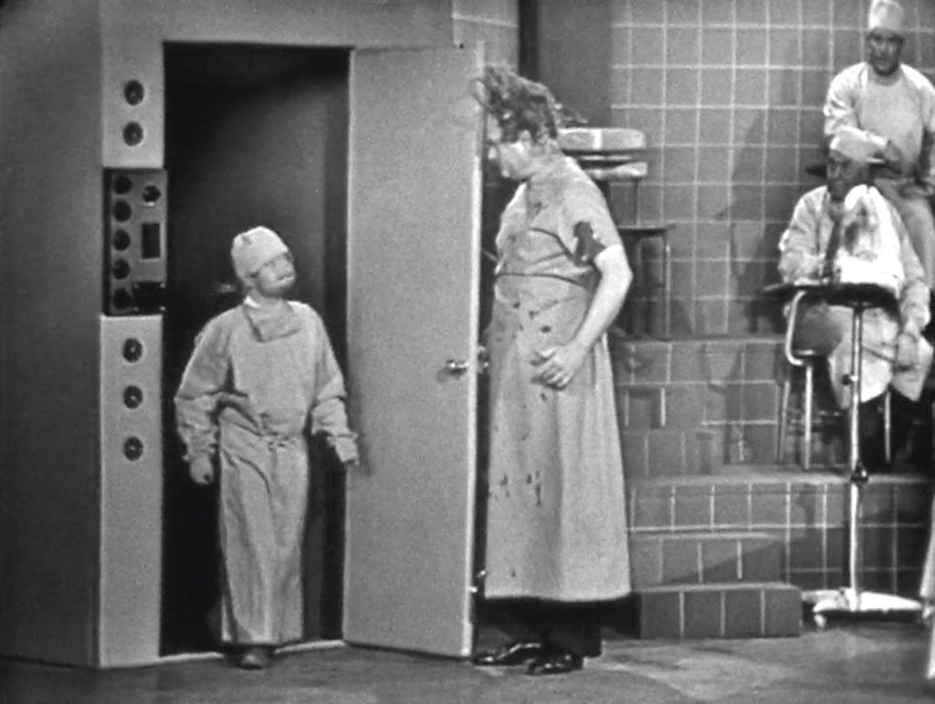 Dr. Schlepper demonstrates his compression chamber