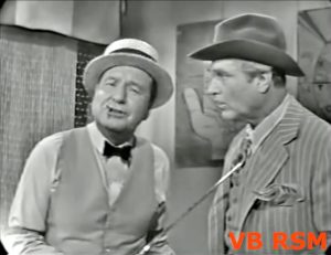 John Ringading (Phil Harris) threatening Clem Kadiddlehopper (Red Skelton) in "The Greatest Schmo on Earth"