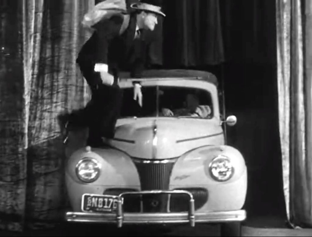 Red Skelton demonstrates the *wrong* way to cross the street!