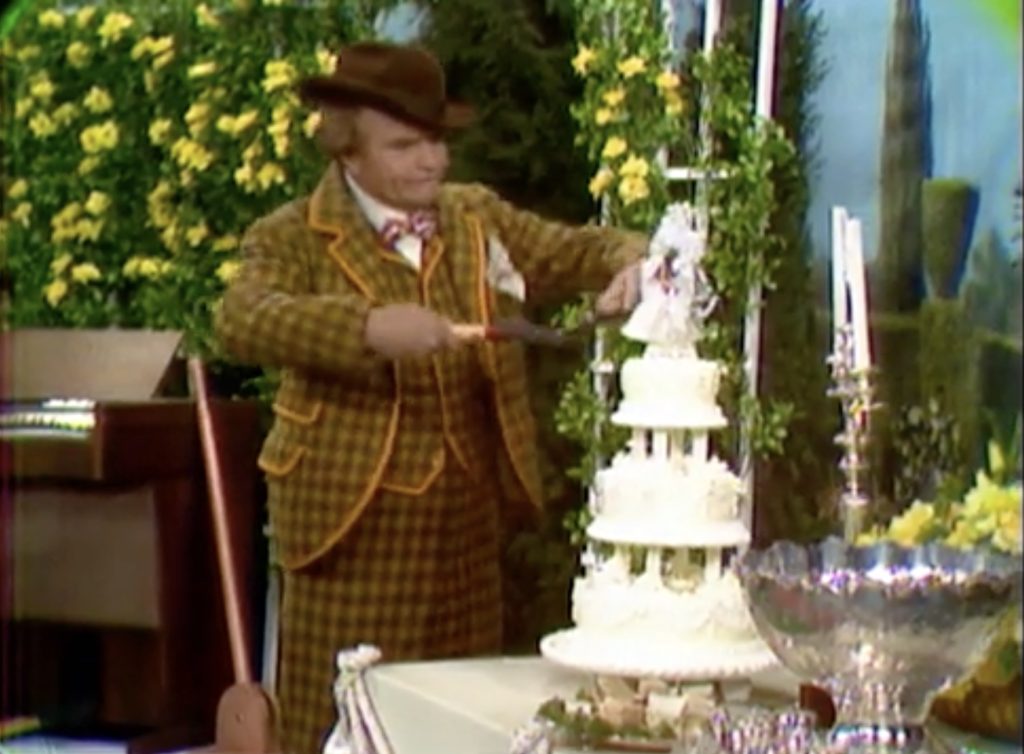 Clem Kadiddlehopper cutting the wedding cake in the worst way possible!