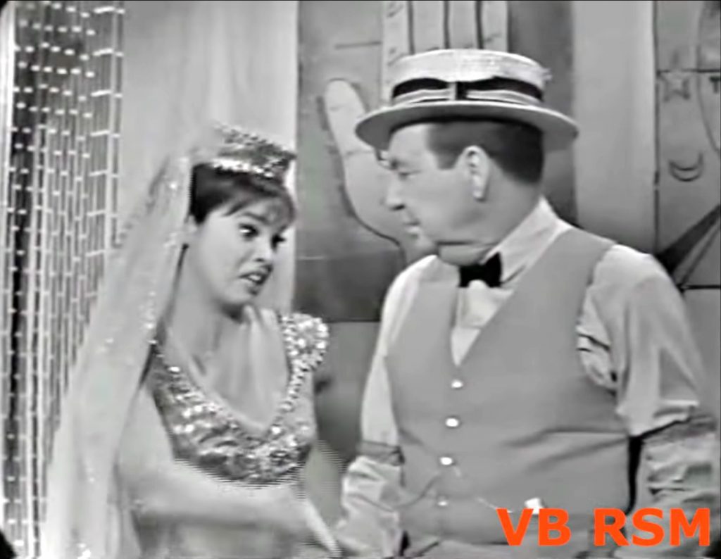 Daisy June (Juliet Prowse) and Mr. Ringading (Phil Harris) in "The Greatest Schmo on Earth"