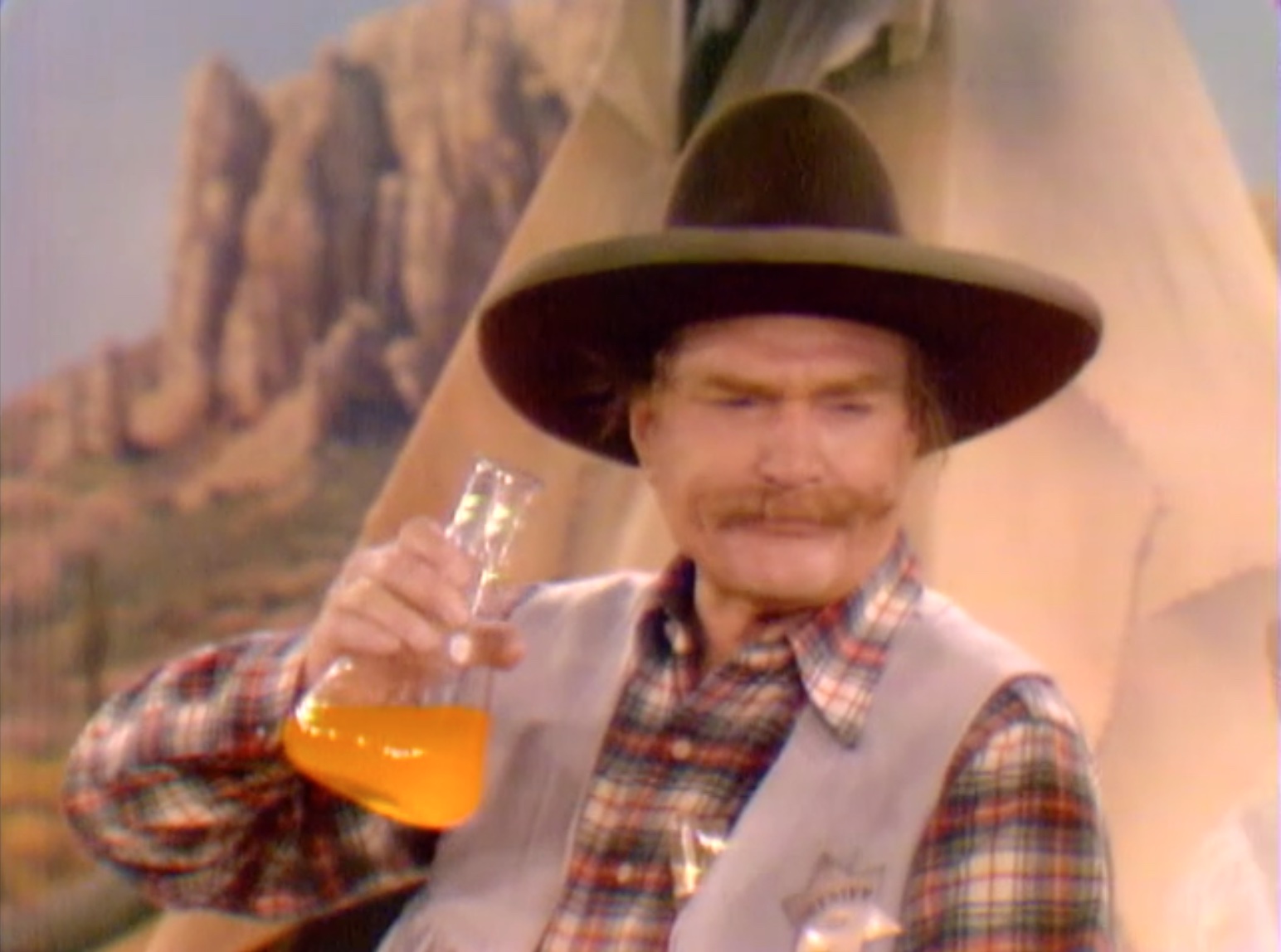 Sheriff Deadeye about to drink Running Fever's bravery potion in "The Fastest Crumb in the West"