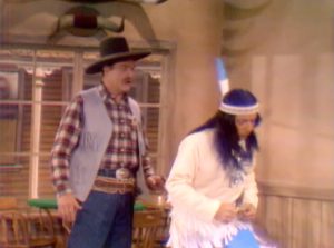 Sheriff Deadeye (Red Skelton) and medicine man Running Fever (Bobby Darin) in town