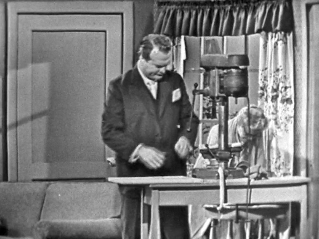 Wilbur the Happy Husband about to hurt himself with he drill press in "How to be Happily Married"