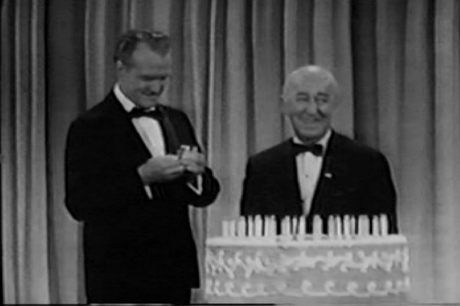 Red Skelton helping Ed Wynn celebrate his 80th birthday