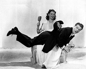 Publicity photo for "I Dood It" - Eleanor Powell spanking Red Skelton with a hair brush!