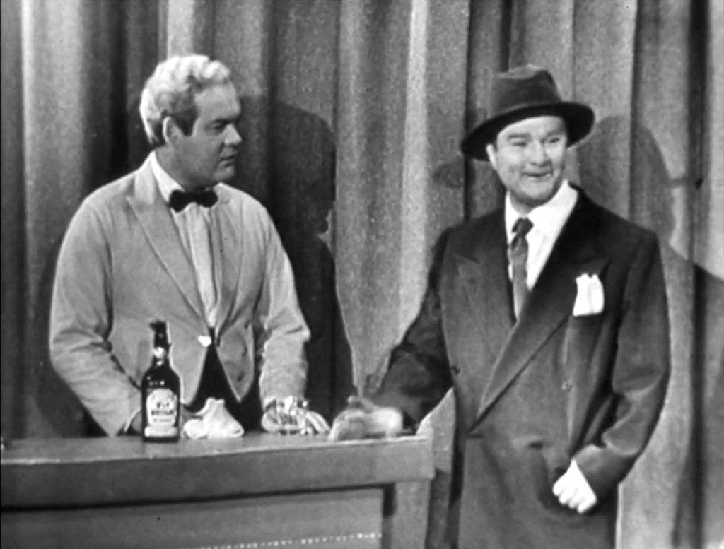 Rod O'Connor with the first drunken bar customer (Willy Lump-Lump) in "Pasquale's Hotel"