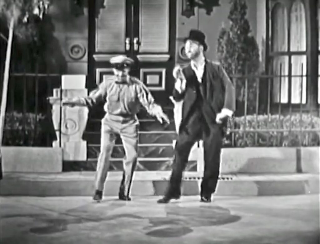 Florist and Freddie the Freeloader do a tap dancing duet