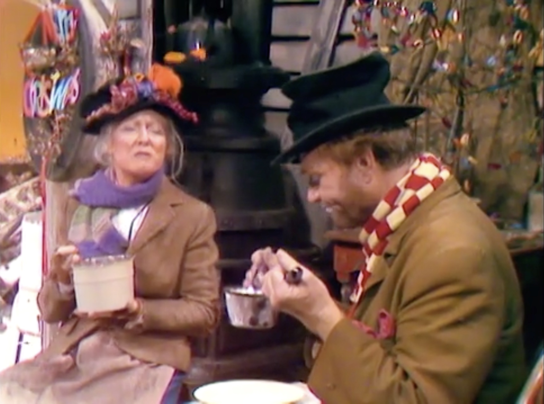 Flower Lady Greer Garson and Freddie the Freeloader enjoy some Mulligan stew