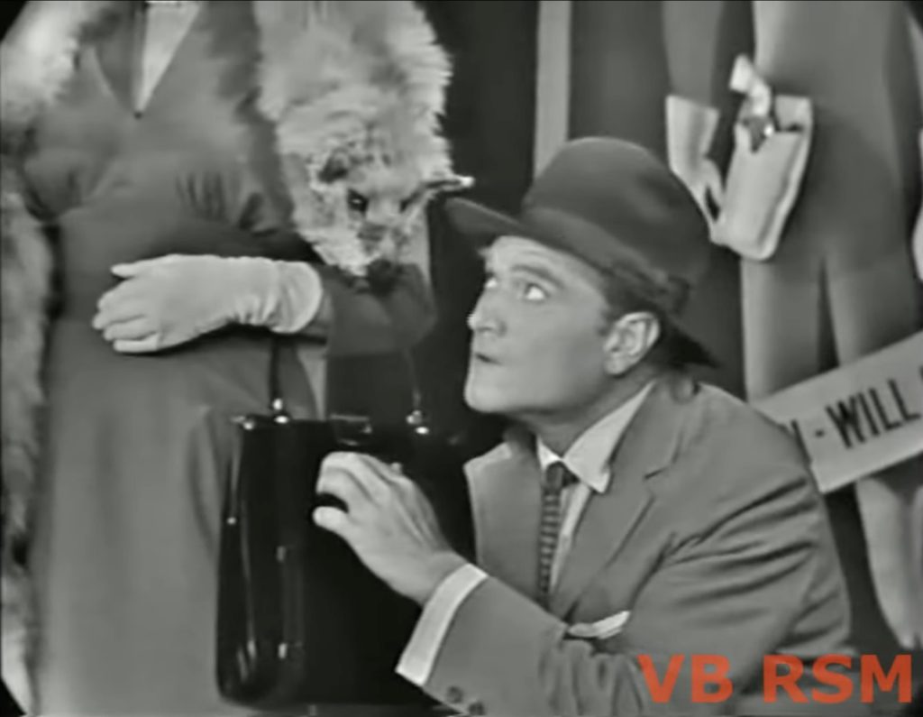 Red Skelton trying to "crack the safe" of a woman's purse - but he's freaked out by her fox stole!