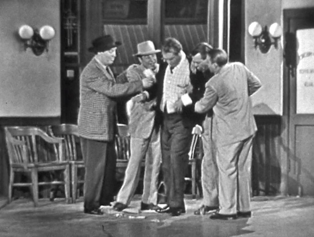 Pickpockets (The Sportsmen Quartet) frame Clem Kadiddlehopper in "It Happened at the Station House"