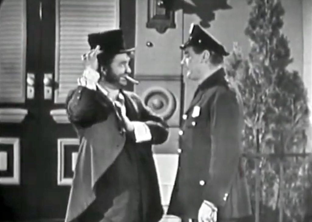 Freddie gets a "friendly" warning from the cop