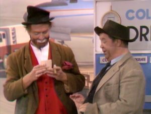 Hobos Freddie the Freeloader (Red Skelton) and Mugsy (Hal Smith) at the airport in The Sweet Smell of Failure