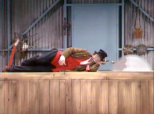 Freddie the Freeloader (Red Skelton) sleeping on a buzz saw in "Never on a Bum Day"