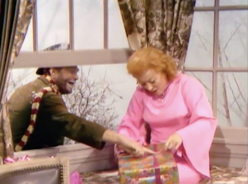 Freddie the Freeloader visits his friend Greer Garson, through the window, in "The Christmas Spirit"