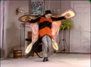 George Appleby, dressed as a giant butterfly to drive his wife Clara insane in "The Agony and the Nag-ony"