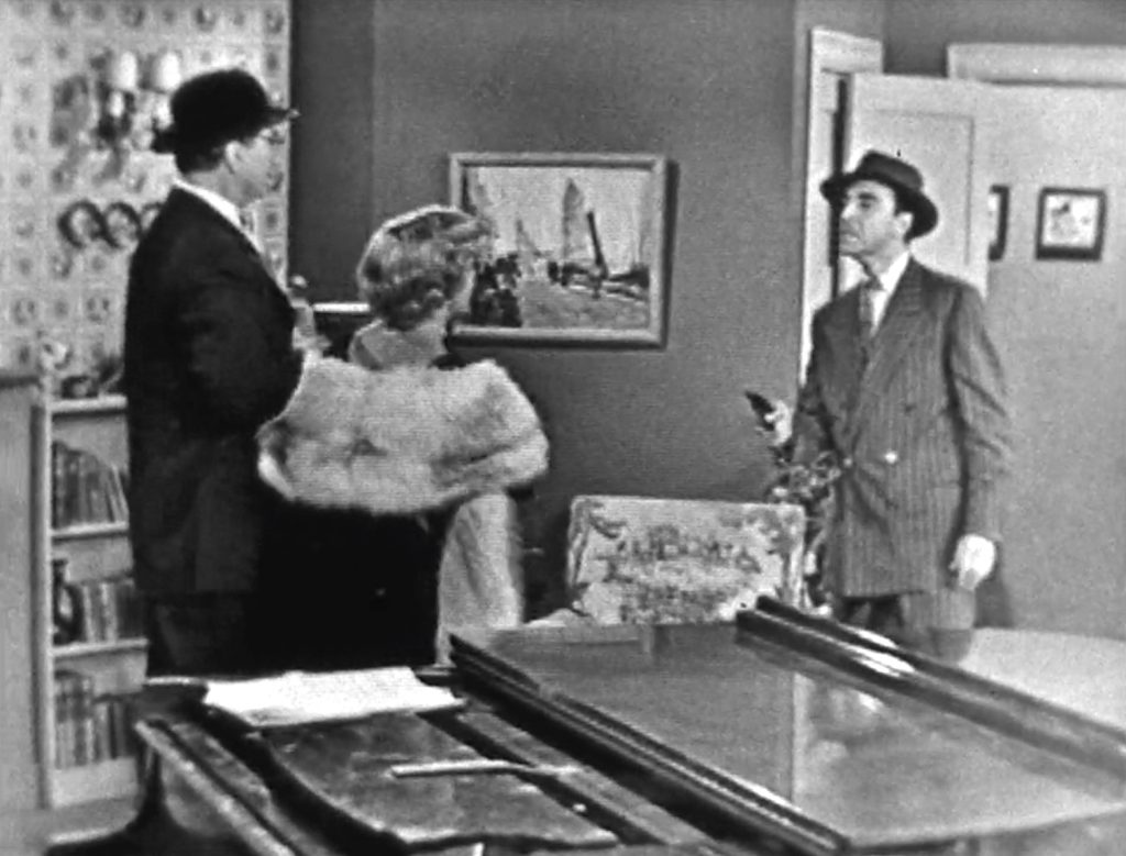 George Appleby, damsel in distress, and Blackie (Jan Arvan)