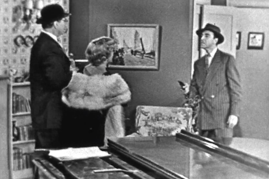 George Appleby, damsel in distress, and Blackie (Jan Arvan)