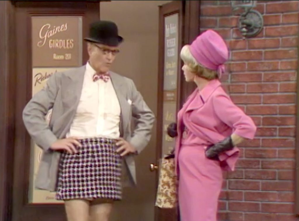 George Appleby models one of his company's mini-skirts. His wife Clara is not amused in "Better Dead than Wed"
