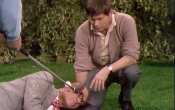 Dr. Harvey Butterfingers (Robert Morse) on the golf course with George Appleby (Red Skelton).in Somebody Down Here Hates Me
