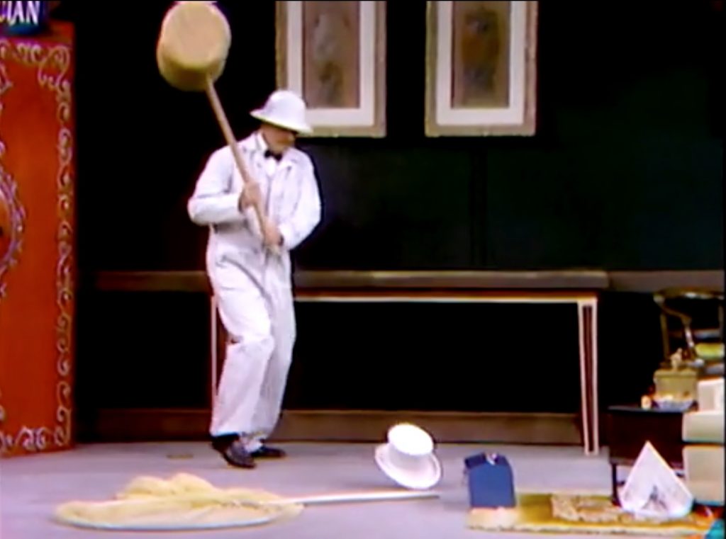 Red Skelton chases the cricket in a hat with a giant mallet!