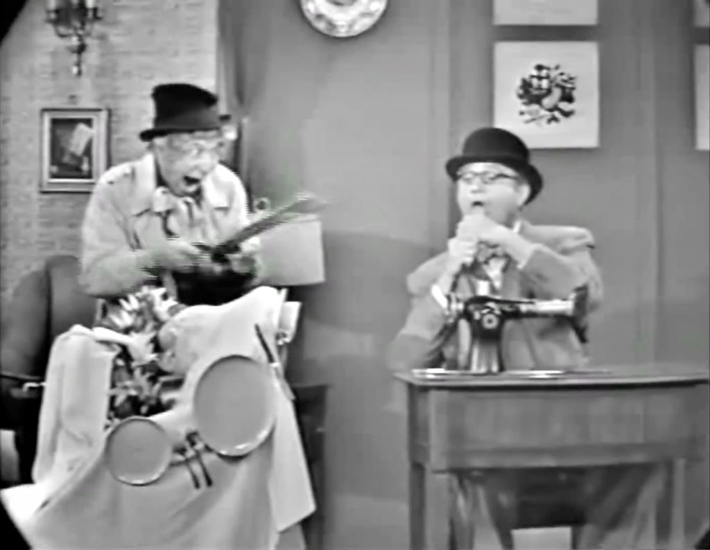Harpo Marx pulls out his giant scissors - to "help" George Appleby by cutting off his tongue!