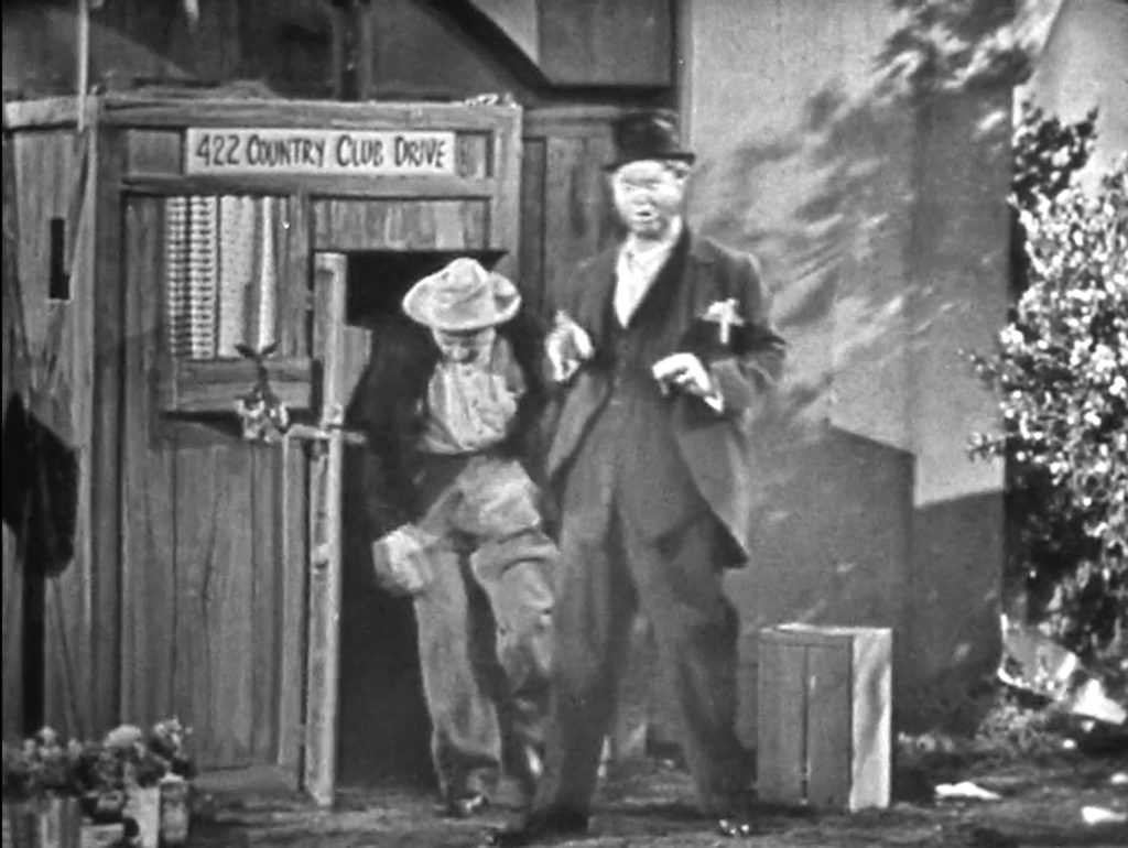 Hobo exiting Freddie's shack