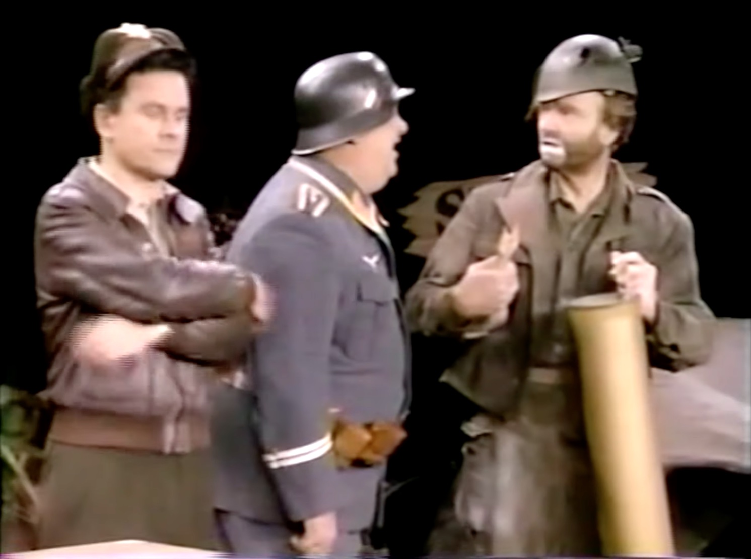 Colonel Hogan, Sergeant Schultz, and Freddie the Freeloader depending on Freddie's survival skills in "How You Gonna Keep 'Em Down in the Dump?"