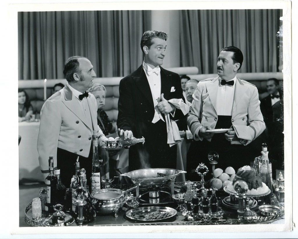 Waiters with Red Skelton (in a "borrowed" tuxedo) in I Dood It