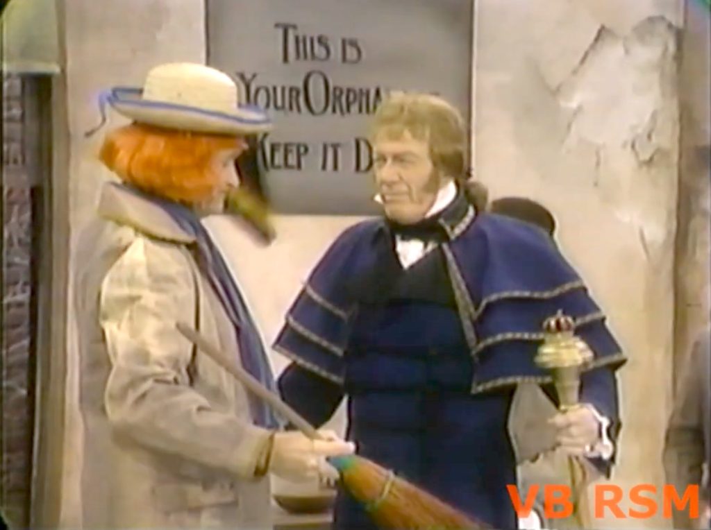 Junior the mean little kid quickly gets on the wrong side of Mr. Rumble (Cyril Ritchard)