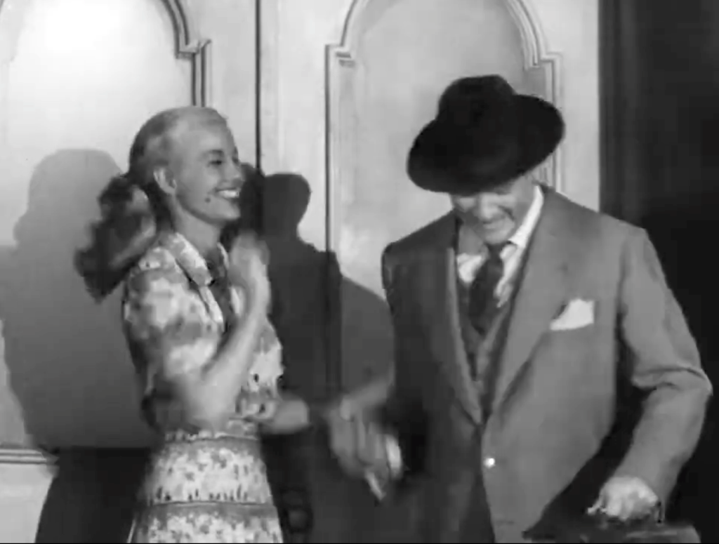 Lucille Knoch repeatedly kissing Red Skelton goodbye in "Freddie the Star-Gazer"