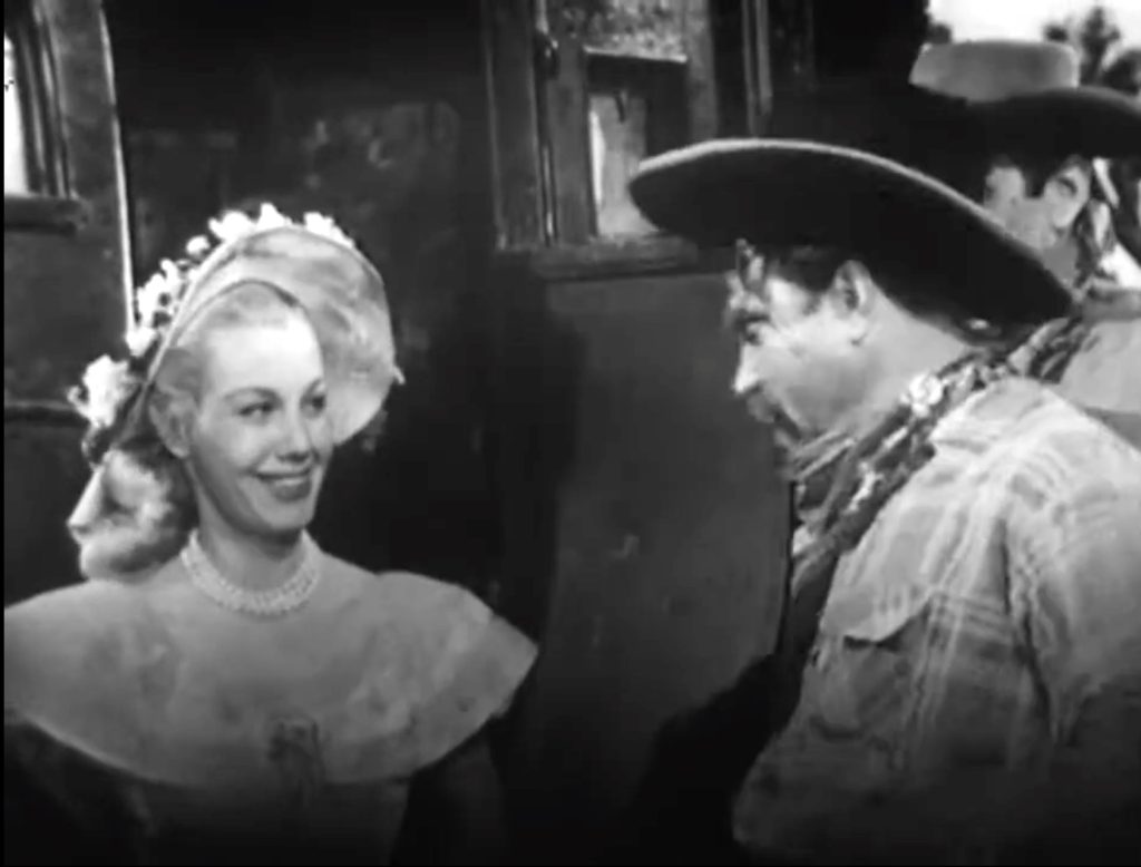 Lovely lady sheriff Lucy Knoch confronts Deadeye and his gang